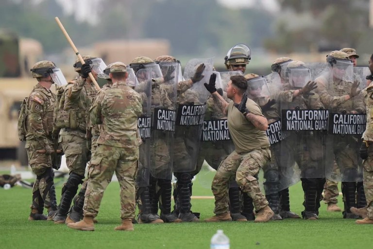 Members of the National Guard conduct exercises after being deployed to the Los Angeles protests Wednesday, June 11, 2025, in Los Alamitos, Calif. (AP Photo/Jae C. Hong)