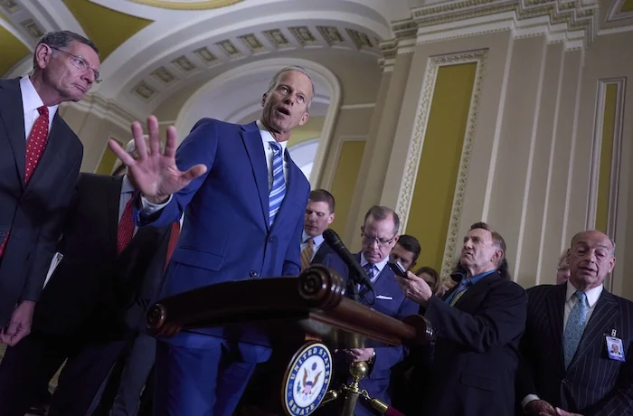 Senate Majority Leader John Thune, R-S.D., joined at left by Sen. John Barrasso, R-Wyo., the GOP whip, meets with reporters at the Capitol in Washington, Tuesday, June 10, 2025.