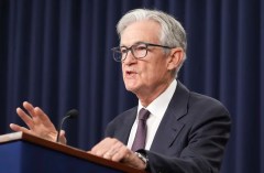 Fed holds interest rates steady despite Trump pressure