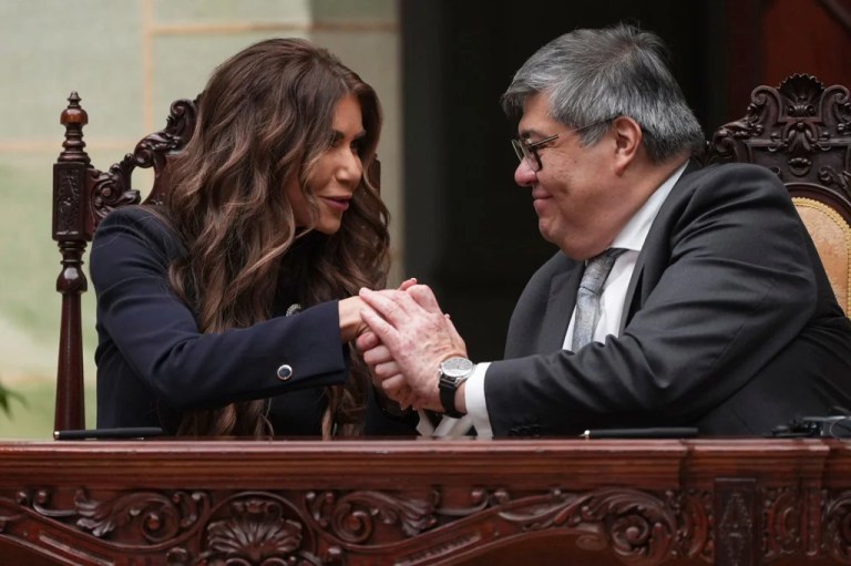 Homeland Security Secretary Kristi Noem, left, shakes hands with Guatemalan Interior Minister Francisco Jiménez at a signing ceremony at the National Palace in Guatemala City, Thursday, June 26, 2025.