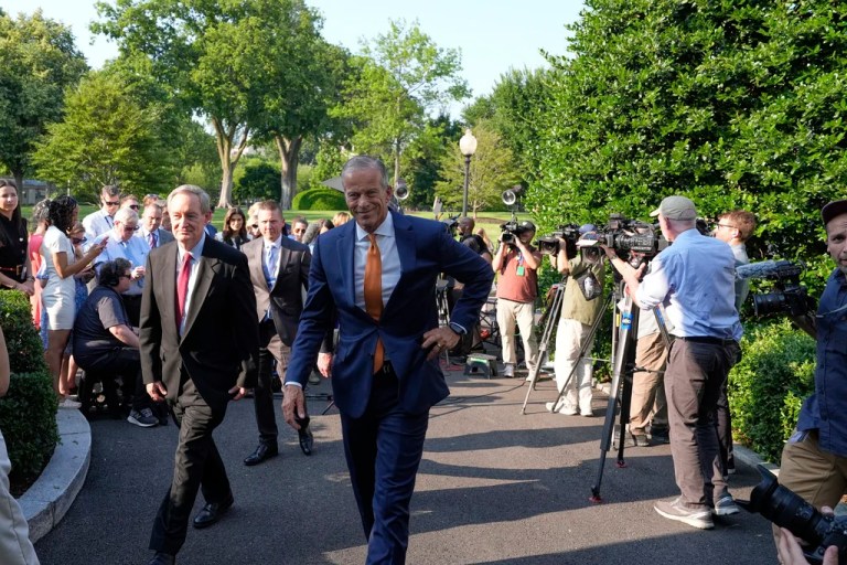 Senate Majority Leader John Thune, R-S.D., and Sen. Mike Crapo, R-Idaho, left, walk away after speaking with reporters after meeting with President Donald Trump at the White House, Wednesday, June 4, 2025, in Washington.
