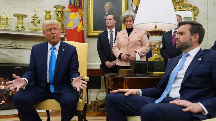 President Donald Trump speaks in the Oval Office of the White House, as White House national security adviser Mike Waltz, White House chief of staff Susie Wiles, and Vice President JD Vance listen.