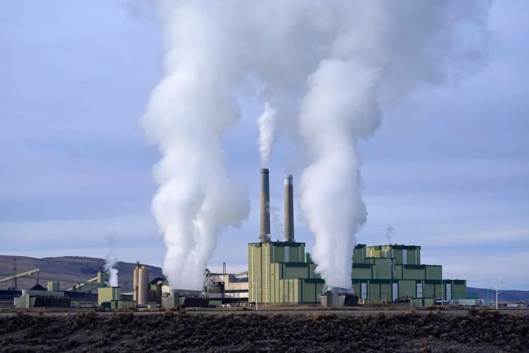 Steam billows from a coal-fired power plant.