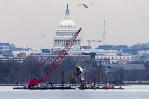 A zoomed-out shot of the Potomac River showing debris from the deadly American Airlines crash.