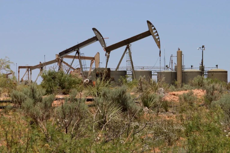 Pump jacks operate in the Permian Basin east of Carlsbad, New Mexico, on Tuesday, May 20, 2025.