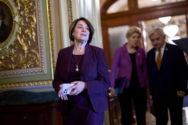 Sen. Amy Klobuchar, D-Minn., pauses as senators arrive for votes and policy meetings, at the Capitol in Washington, Tuesday, June 17, 2025. (AP Photo/J. Scott Applewhite)