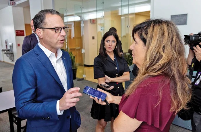 Sen. Dave McCormick (R-PA) with President Donald Trump; below, Gov. Josh Shapiro (D-PA) speaks with the Washington Examiner’s Salena Zito. (Graeme Jennings/The Washington Examiner)