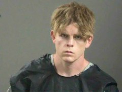 Arkansas teacher charged in stabbing deaths of father and mother hiking with their children