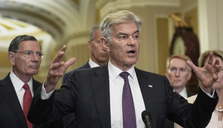 Center for Medicare and Medicaid Services Administrator Dr. Mehmet Oz, center, talks after a policy luncheon on Capitol Hill, Tuesday, June. 17, 2025, in Washington.