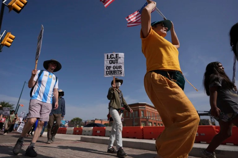 Immigration advocates protest recent detentions by ICE outside the immigration court in San Antonio, Texas, Tuesday, July 1, 2025.