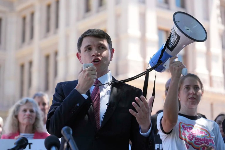 James Talarico with a microphone