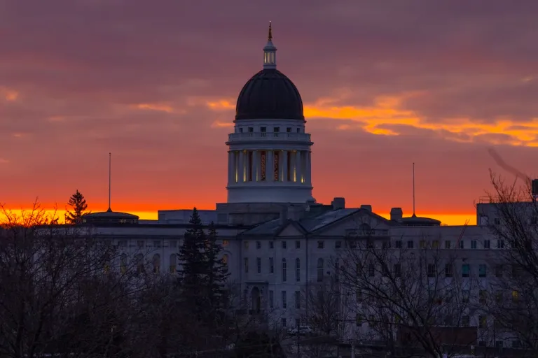 The Maine State House is seen at dawn, Jan. 3, 2024, in Augusta, Maine. A series of gun safety bills introduced after the deadliest shooting in Maine history appears to be headed toward final passage as the state Legislature races to wrap up its session the week of April 15, 2024. (AP Photo/Robert F. Bukaty, File)