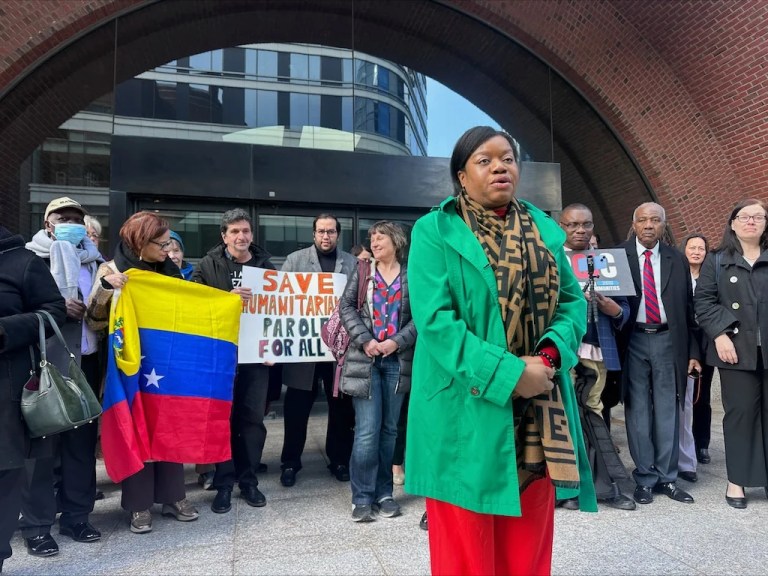 Immigration advocates speak outside a federal court in Boston, Thursday, April 10, 2025, after a hearing aiming to halt the Trump administration's from stopping a program that allowed hundreds of thousands of Cubans, Haitians, Nicaraguans, and Venezuelans to temporarily live in the country. (AP Photos/Michael Casey)