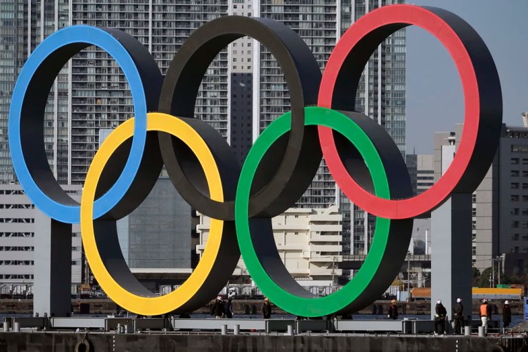 The Olympic rings are reinstalled after being taken down for maintenance ahead of the postponed Tokyo 2020 Olympics in the Odaiba section in Tokyo, Dec. 1, 2024.