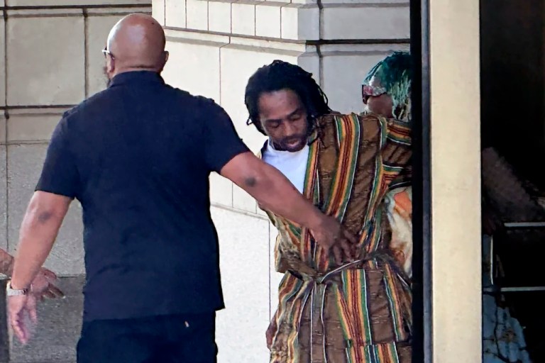 District of Columbia Councilman Trayon White, center, walks out of the federal courthouse after his initial appearance, Aug. 19, 2024 in Washington.