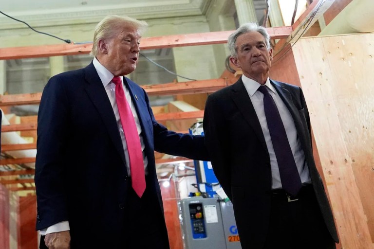 President Donald Trump speaks with Federal Reserve Chairman Jerome Powell.
