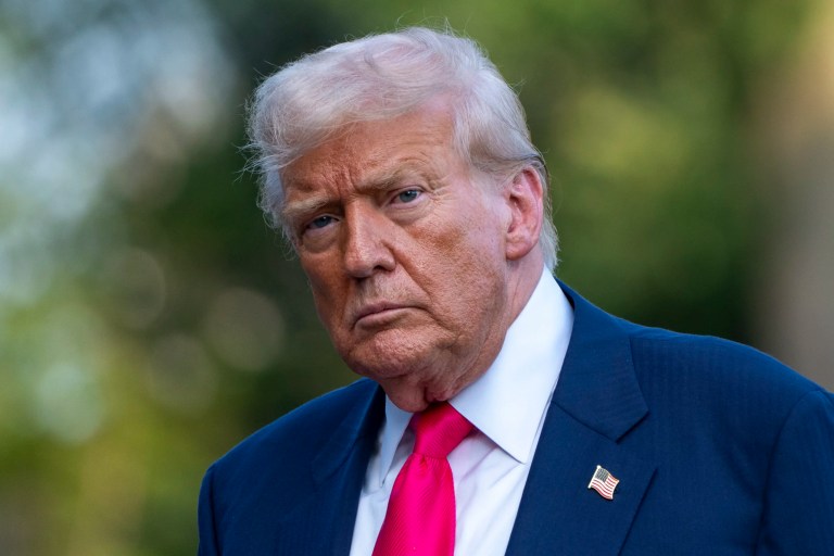 President Donald Trump walks from Marine One after arriving on the South Lawn of the White House, Tuesday, July 15, 2025, in Washington.