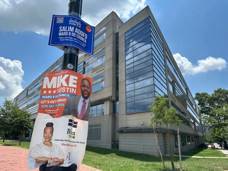 Campaign signs for Ward 8 city council candidates are displayed outside a District of Columbia government building in southeast Washington, Wednesday, July 9, 2025.
