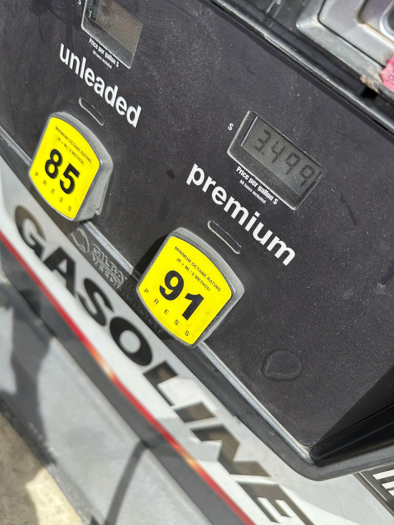 The per-gallon price is displayed electronically on the gasoline pump at a Costco station Thursday, Aug. 7, 2025, in Sheridan, Colorado.