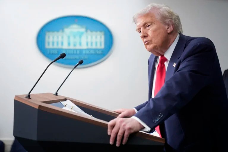 President Donald Trump listens to a question from a reporter in the James Brady Press Briefing Room at the White House, Monday, Aug. 11, 2025, in Washington.