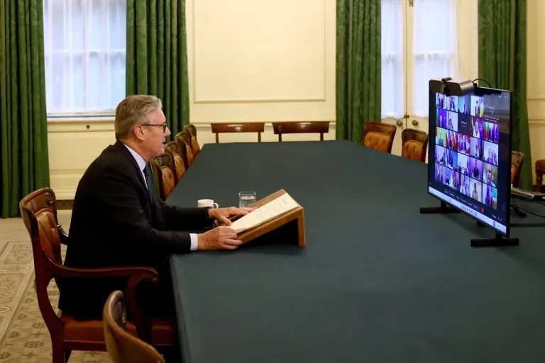 Britain's Prime Minister Keir Starmer co-chairs a videoconference call with European leaders on Ukraine, in London, Wednesday, Aug. 13, 2025.