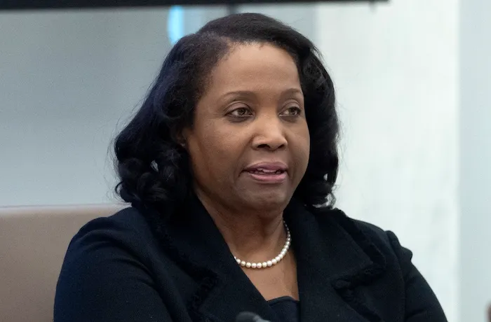 Federal Reserve Board of Governors member Lisa Cook listens during an open meeting of the Board of Governors at the Fed, June 25, 2025, in Washington.