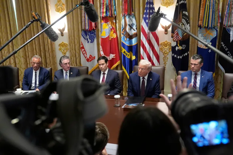 President Donald Trump speaks during a Cabinet meeting, Tuesday, Aug. 26, 2025, at the White House in Washington, D.C., with, from left, Secretary of Health and Human Services Robert F. Kennedy, Jr., Secretary of the Interior Doug Burgum, Secretary of State Marco Rubio, and Secretary of Defense Pete Hegseth.