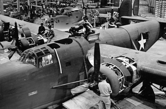 Fuselage and engine components are assembled for U.S. B-24 bombers at a Ford Motor Co. plant near Detroit, December 1942. (Archive Photos/Getty)
