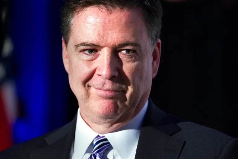 FBI Director James Comey adddresses the Intelligence and National Security Alliance Leadership Dinner in Alexandria, Va., Wednesday, March 29, 2017. (AP Photo/Cliff Owen)