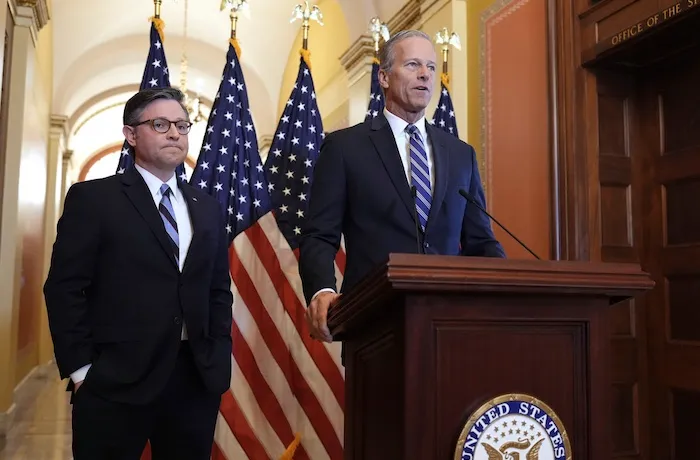 In a show of Republican unity, Speaker of the House Mike Johnson, R-La., left, and Senate Majority Leader John Thune, R-S.D., make statements to reporters ahead of vote in the House to pass a bill on President Donald Trump's top domestic priorities of spending reductions and tax breaks, at the Capitol in Washington,
