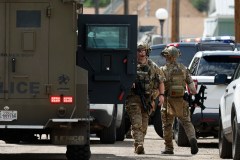 Officials scour mountainous area of Montana for ex-US soldier suspected of killing 4 in bar shooting