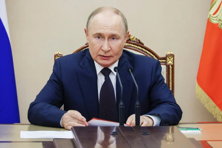 Russian President Vladimir Putin chairs the Security Council meeting at the Kremlin in Moscow, Russia, Friday, Aug. 8, 2025.