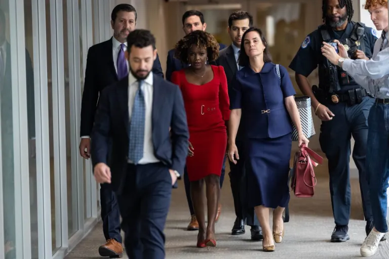 Former White House press secretary Karine Jean Pierre, center, arrives on Friday, Sept. 12, 2025, to testify in front of the House Oversight Committee in Washington.