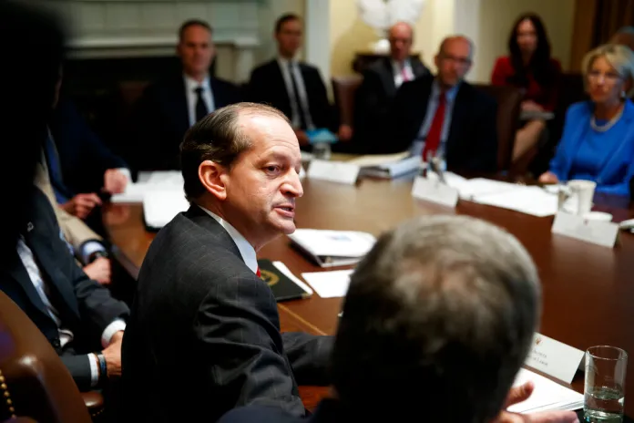 Outgoing Labor Secretary Alex Acosta speaks to President Donald Trump and others.