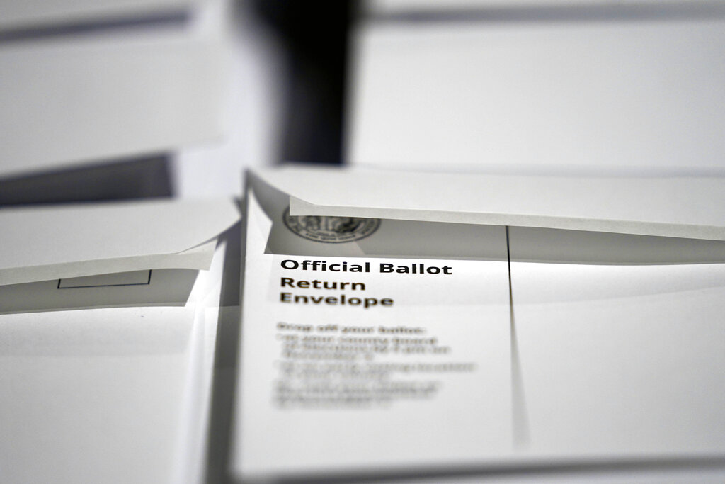 NextImg:DOJ sues six states for failure to provide voter data