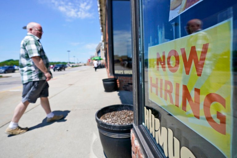 A man walks into 5th Avenue Deli and Grill, Friday, June 4, 2021, in Mayfield Heights, Ohio.