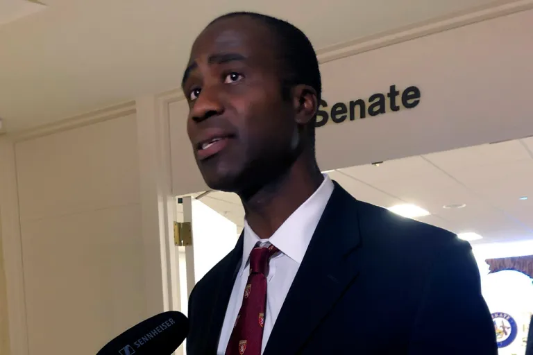 Dr. Joseph Ladapo speaks with reporters after the Florida Senate confirmed his appointment as the state's surgeon general on Feb. 23, 2022, in Tallahassee, Fla. An analysis that was the basis of a highly criticized recommendation from Florida’s surgeon general cautioning young men against getting the COVID-19 vaccine omitted information that showed catching the virus could increase the risk of a cardiac-related death much more than getting the shot. That's according to drafts of the analysis obtained by the Tampa Bay Times.