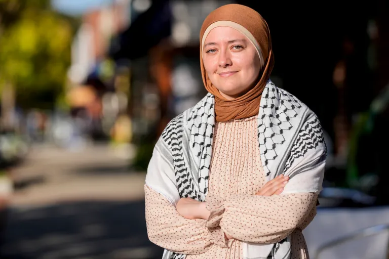 Georgia state Rep. Ruwa Romman poses for a photo with her arms crossed.