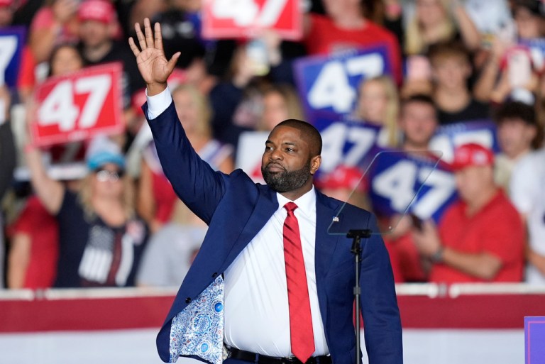 Rep. Byron Donalds (R-FL), waves before Republican presidential nominee former President Donald Trump arrives at a campaign rally at the Resch Center, Wednesday, Oct. 30, 2024, in Green Bay, Wis. (AP Photo/Alex Brandon)