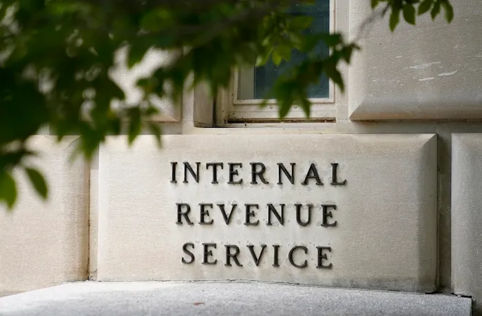 FILE - A sign outside the Internal Revenue Service building is photographed May 4, 2021, in Washington