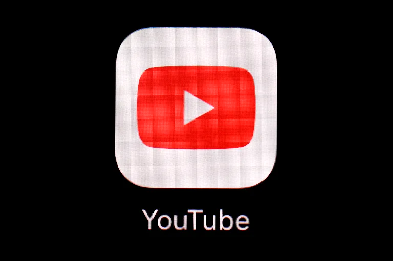 The YouTube logo is shown on a device.