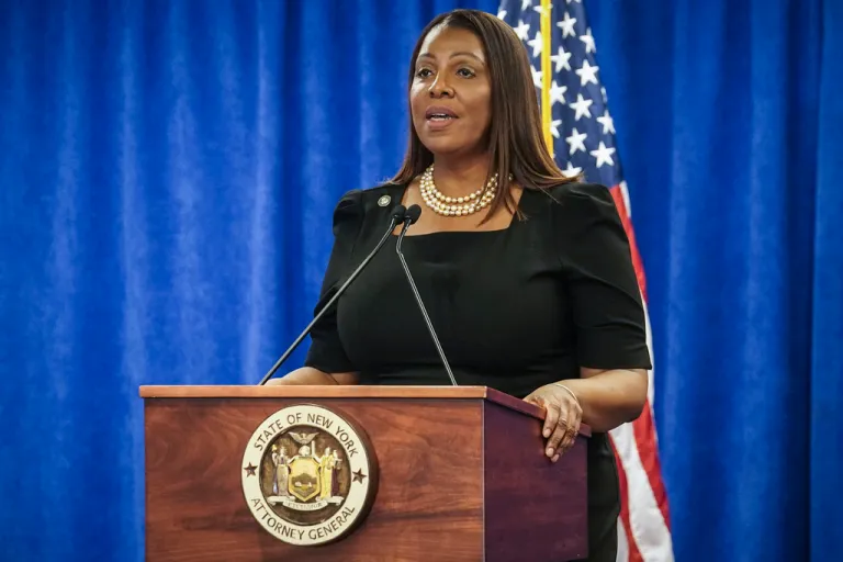 New York Attorney General Letitia speaks from podium.
