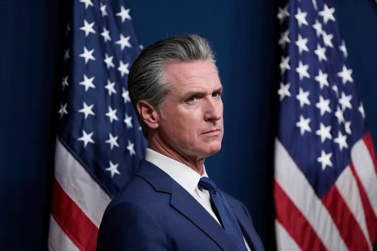 California Gov. Gavin Newsom prepares to speak before signing legislation calling for a special election on a redrawn congressional map on Thursday, Aug. 21, 2025, in Sacramento, Calif.