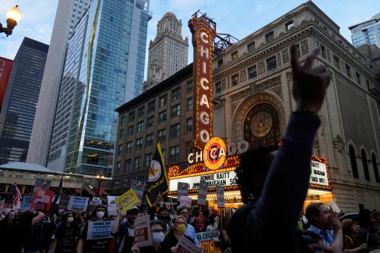 Crowds of people protest ICE presence in Chicago during 