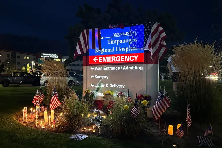 Flowers rest next to a sign for Timpanogos Regional Hospital after Charlie Kirk was shot and killed Wednesday, Sept. 10, 2025, in Orem, Utah.
