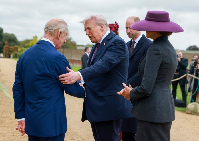 Trump shaking hands with King Charles