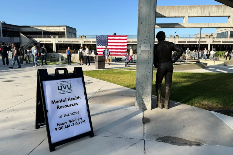 People walk around the site where conservative activist Charlie Kirk was shot and killed at Utah Valley University last week, Wednesday, Sept. 17, 2025, in Orem, Utah.