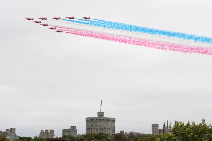 The Red Arrows fly in formation over Windsor Castle during the State visit of President Donald Trump in Windsor, England, Wednesday, Sept. 17, 2025.
