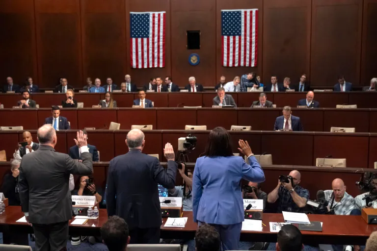District of Columbia Attorney General Brian Schwalb, from left, D.C. Council Chairman Phil Mendelson, and D.C. Mayor Muriel Bowser are sworn in.