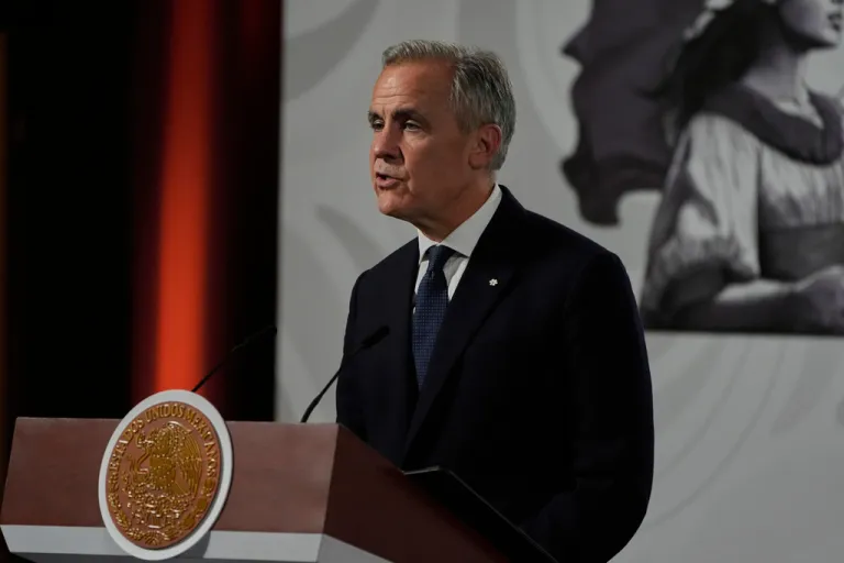 Canada's Prime Minister Mark Carney speaks during a joint press conference with Mexico's President Claudia Sheinbaum at the National Palace in Mexico City, Thursday, Sept. 18, 2025. (AP Photo/Fernando Llano)